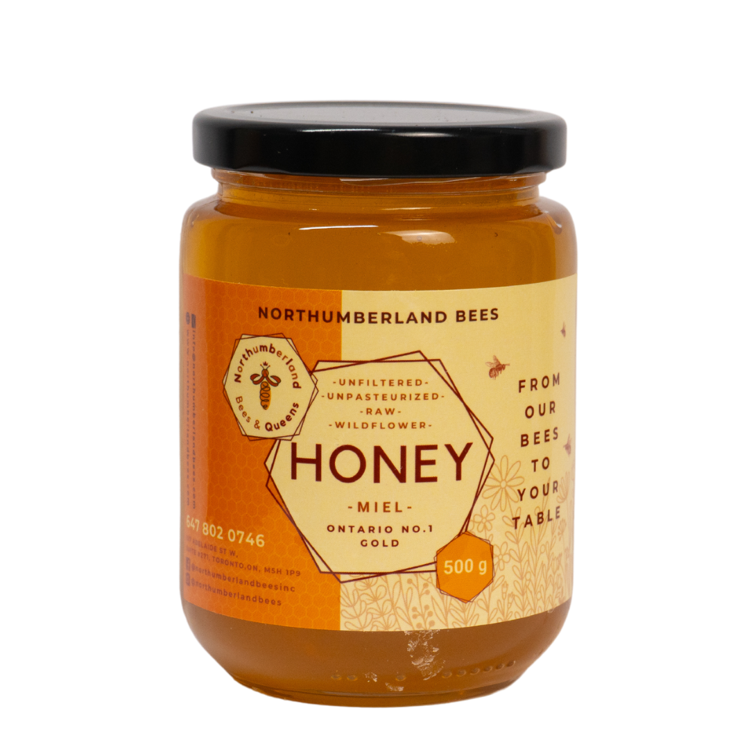 Jar of raw Ontario honey sourced from local bees.